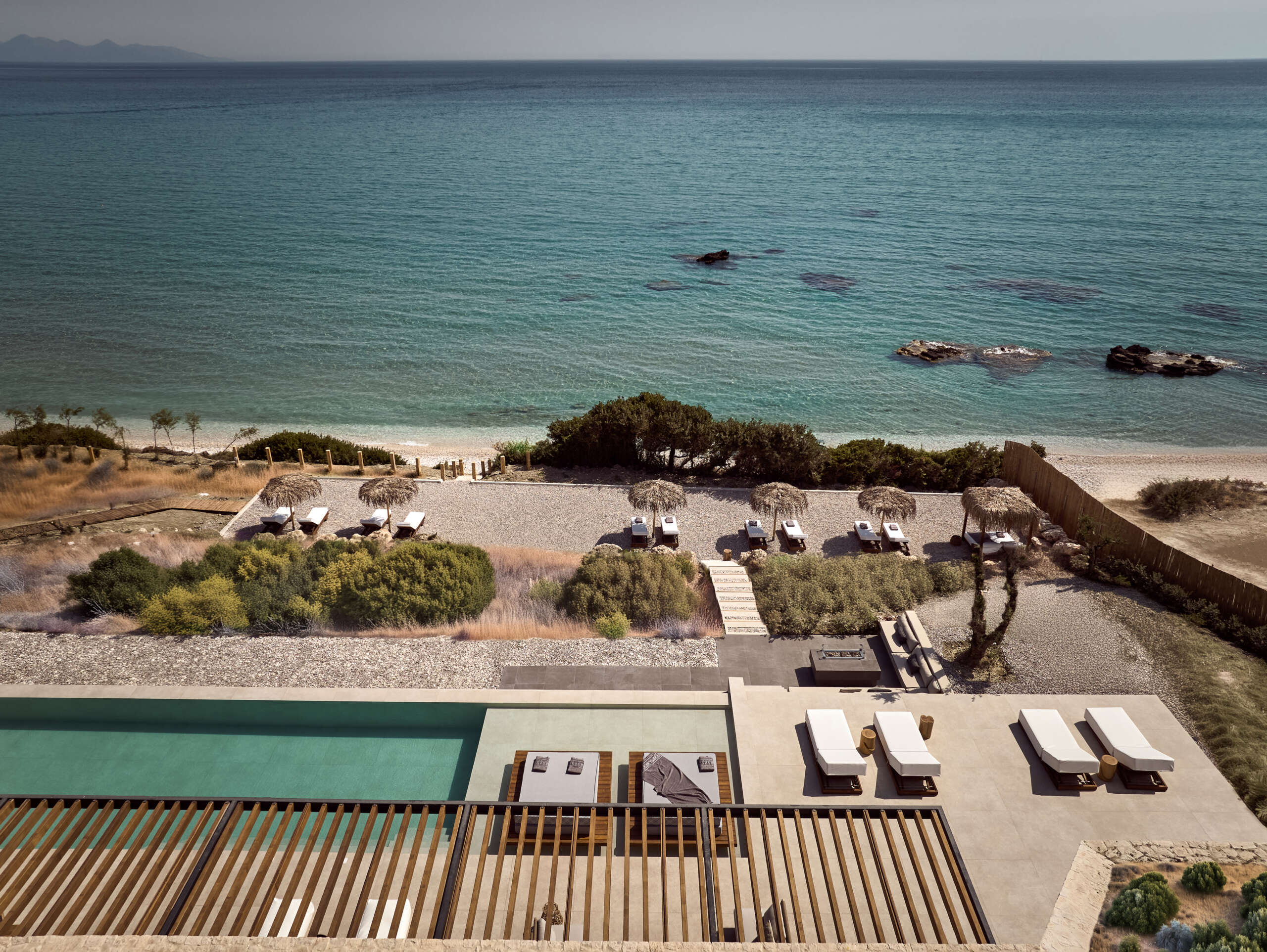 An iconic villa, located directly in front of the sea.