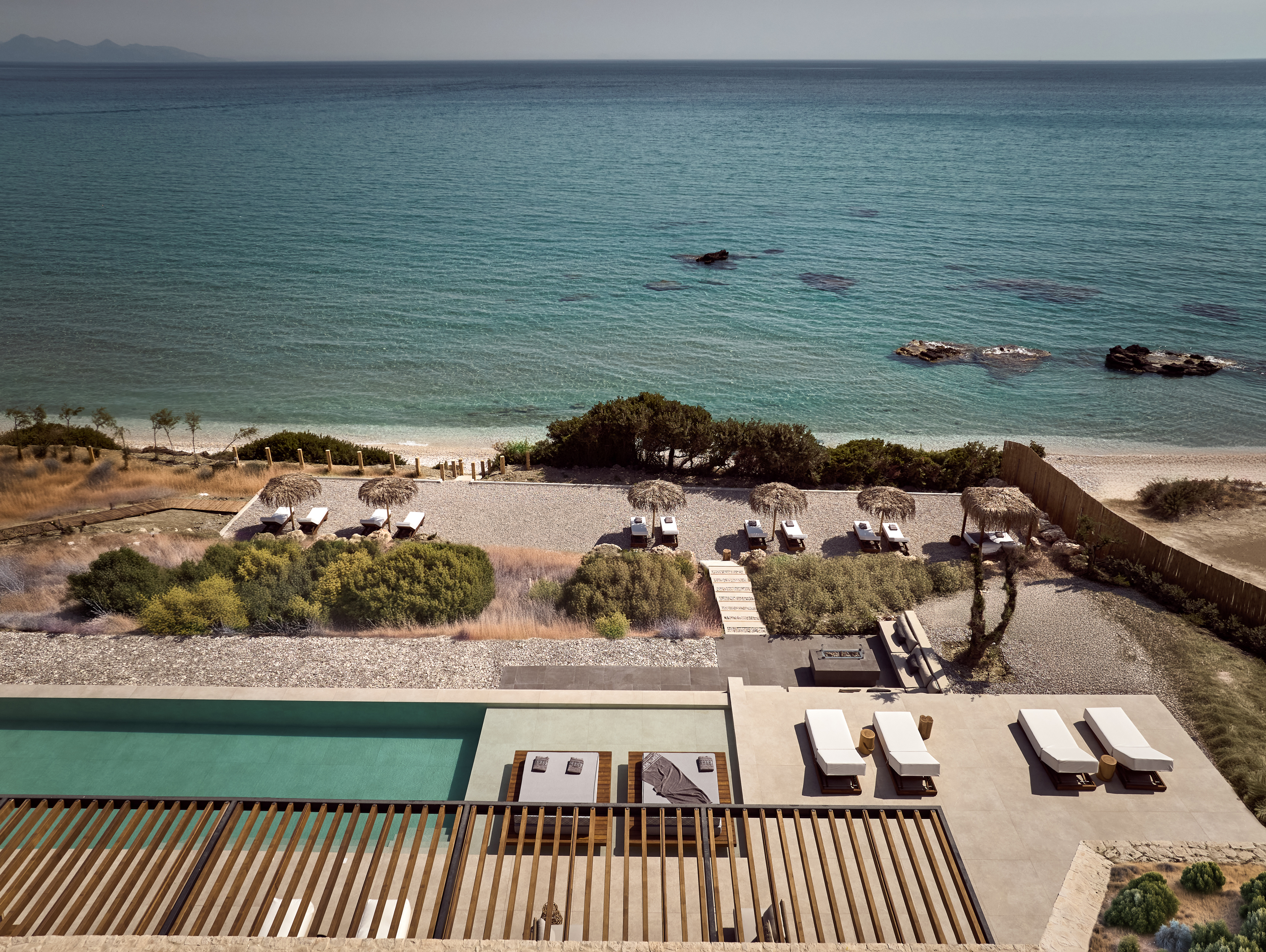An iconic villa, located directly in front of the sea.