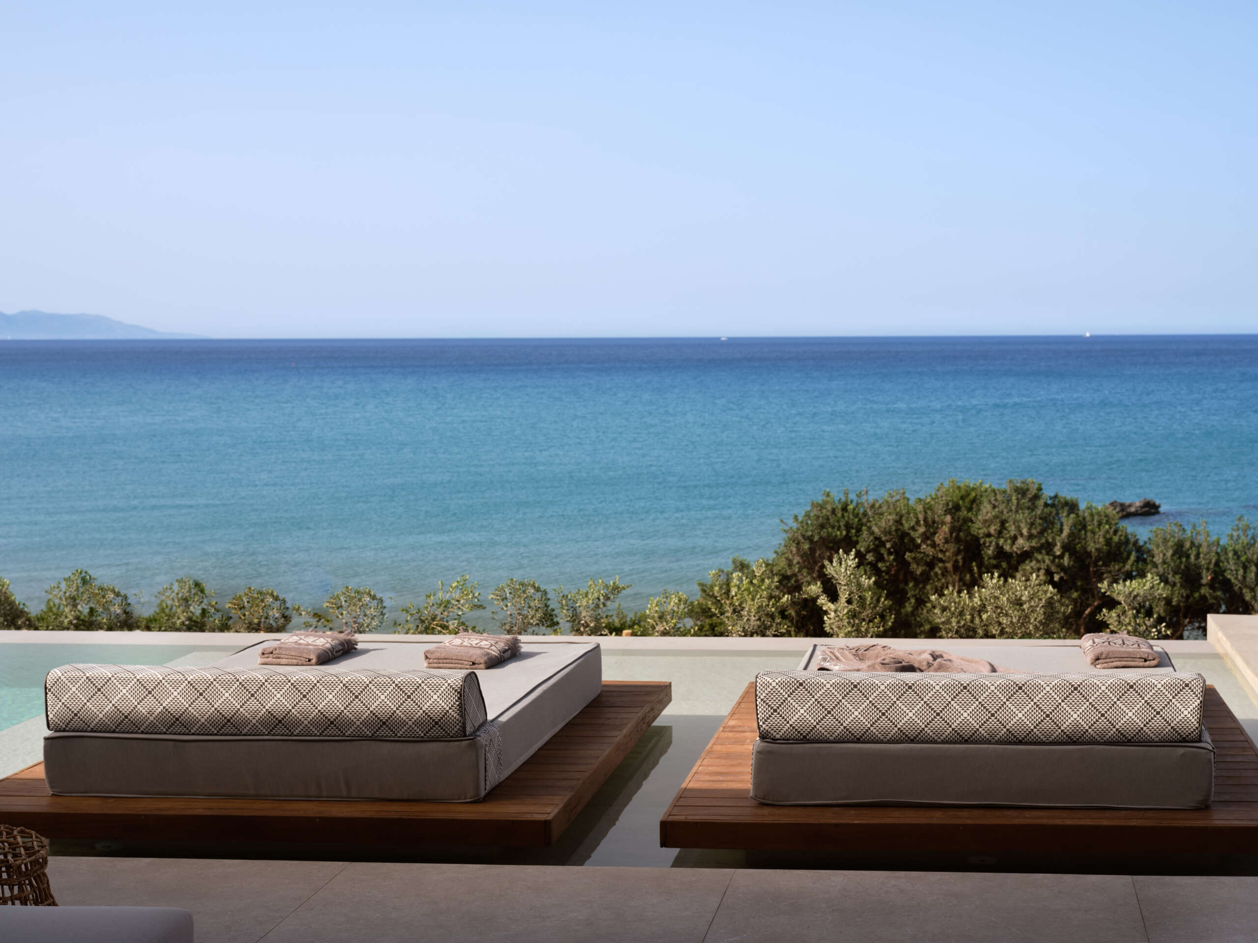 Iconic swim up sun-beds.